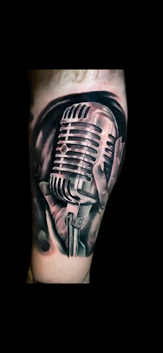 Explore banner tattoo ideas, creative tattoo ideas in Denver, available at Cleopatra INK Tattoo & Piercing Denver Studio