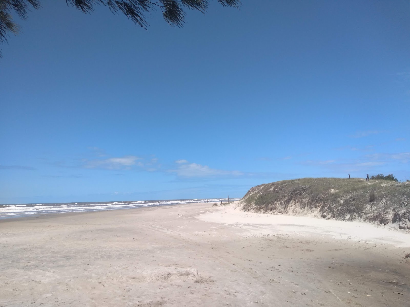 Foto van Praia de Cidreira en de nederzetting