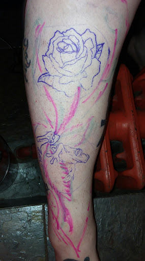 Explore dog paw print tattoo ideas, creative tattoo ideas in Long Branch, available at Body Art World Tattooing