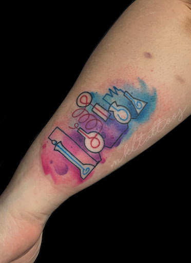 Explore motorbike tattoo ideas, creative tattoo ideas in Nashville, available at Mel Lockett Tattoos