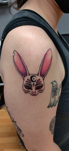 Explore santa tattoo ideas, creative tattoo ideas in Santa Clara, available at Vampire Battle Mansion Tattoo and Piercing