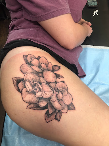 Find boob tattoo ideas for females for your next unique tattoo in Leesville at Integrity Tattoo