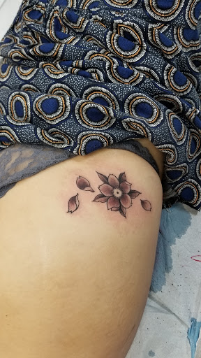 Explore dolphin tattoo ideas, creative tattoo ideas in Staten Island, available at Bound For Glory Tattoo