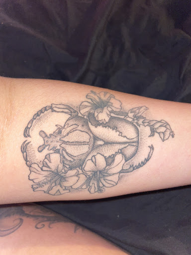 Explore ladies hand tattoo ideas, creative tattoo ideas in Hinesville, available at Ink Survivor Tattoo & Piercing