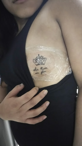 Explore butterfly and rose tattoo ideas, creative tattoo ideas in Bowling Green, available at Taboo Tattoos and Piercings