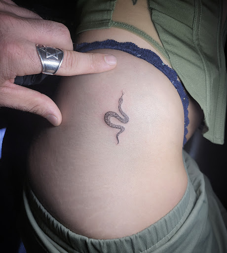 Explore jack and sally couple tattoos ideas, creative tattoo ideas in Los Angeles, available at Motis Tattoos