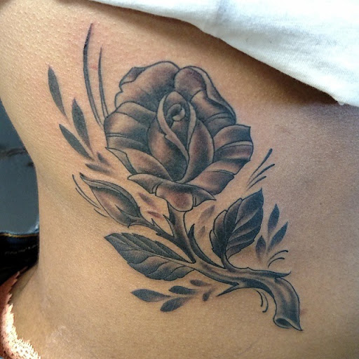 Explore lower abdominal tattoo ideas, creative tattoo ideas in Myrtle Beach, available at Aces High Tattoo