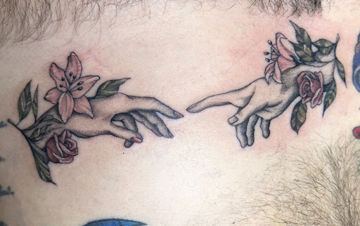 Explore small tattoo ideas neck, creative tattoo ideas in Cleveland, available at Vanaheim Tattoo and Piercing Studio