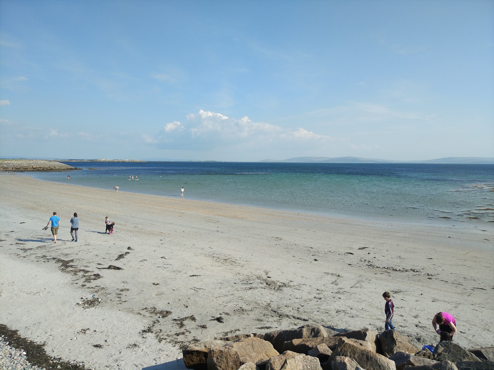 Fotografija Grattan Beach z svetel pesek površino