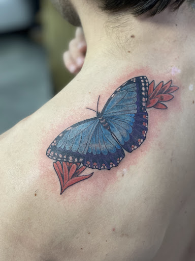 Explore womens neck tattoos ideas, creative tattoo ideas in Lake Bluff, available at Evolution Body Arts