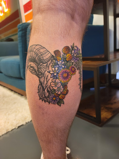 Explore front of neck tattoo ideas, creative tattoo ideas in Boulder, available at Love You Tattoo