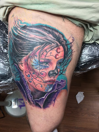 Find tattoo anklet ideas for your next unique tattoo in Edgewood at Evolved Body Arts