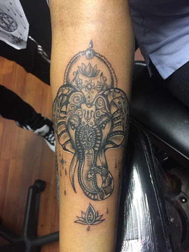 Explore stomach tattoo ideas for females, creative tattoo ideas in Norristown, available at IRON TATTOO