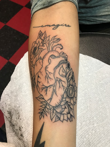 Explore chanel tattoo ideas, creative tattoo ideas in Plainfield, available at Dark Souls Ink 2