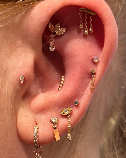Explore back ear tattoo ideas, creative tattoo ideas in Kennewick, available at Citrine Piercing Studio