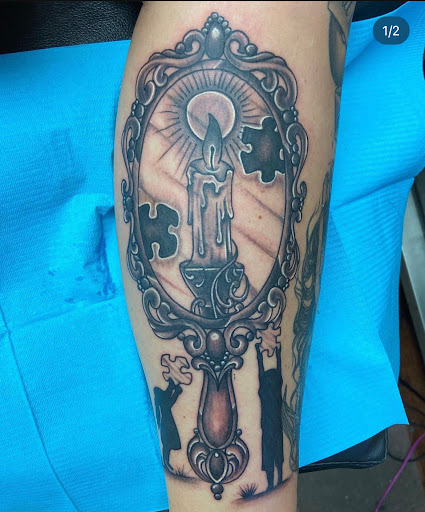 Explore new father tattoo ideas, creative tattoo ideas in Cincinnati, available at Soul Rage Tattoo