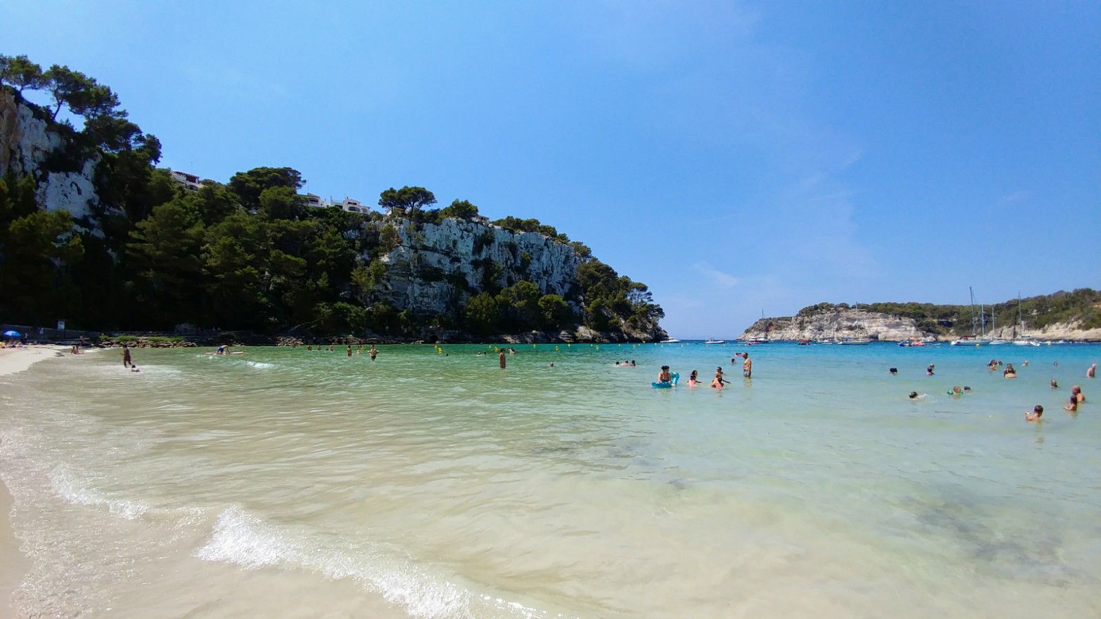 Photo of Cala Galdana beach and its beautiful scenery