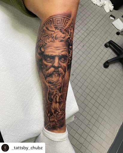 Explore banner tattoo ideas, creative tattoo ideas in Fort Wayne, available at Grade A Tattoos and Body Piercing