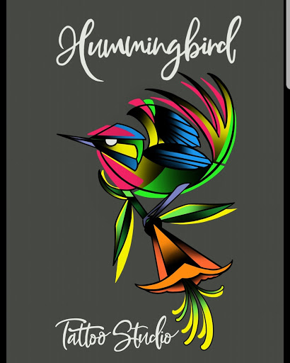Explore black bird tattoo ideas, creative tattoo ideas in Powell, available at Hummingbird Tattoo Studio