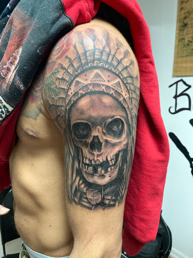 Explore mountain biking tattoo ideas, creative tattoo ideas in Owosso, available at Expressions Body Art Studio