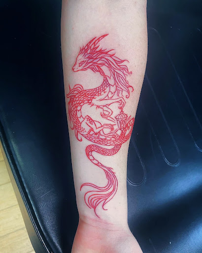 Explore men's inner bicep tattoo ideas, creative tattoo ideas in Saint Petersburg, available at Cthulhu Tattoo & Body Piercing