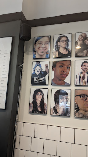 Find small wolf tattoo ideas for your next unique tattoo in Philadelphia at Infinite Body Piercing