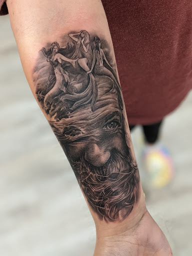 Explore chaos tattoo ideas, creative tattoo ideas in Monroe, available at The Chapel