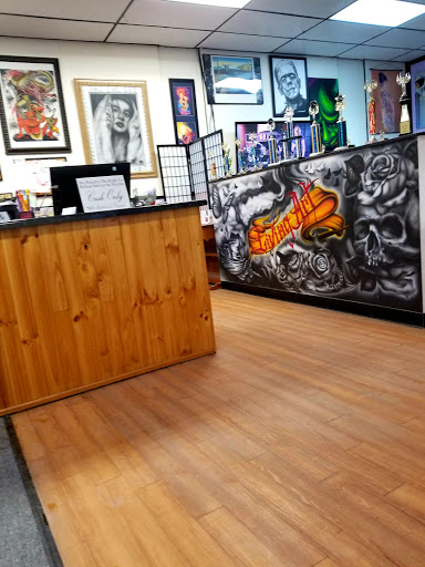 Explore griffin tattoo ideas, creative tattoo ideas in Sioux City, available at Living Art Tattoo Studio