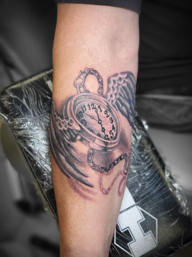 Explore hawk tattoo ideas for females, creative tattoo ideas in Kansas City, available at Divine Tattoo Parlor
