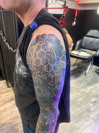Explore half sleeve forearm tattoo ideas, creative tattoo ideas in Linn Creek, available at Hillard Skillard Tattoos, LLC.