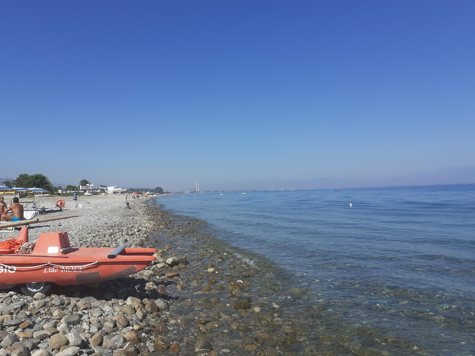 Foto av Gallarate beach med grå sand och småstenar yta