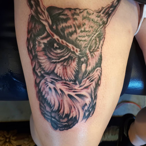 Find tattoos ideas for moms for your next unique tattoo in Kerhonkson at RedHawk Tattoos