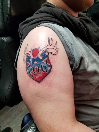 Explore dragon sleeve tattoo ideas, creative tattoo ideas in Duncanville, available at Fearless Tattoos