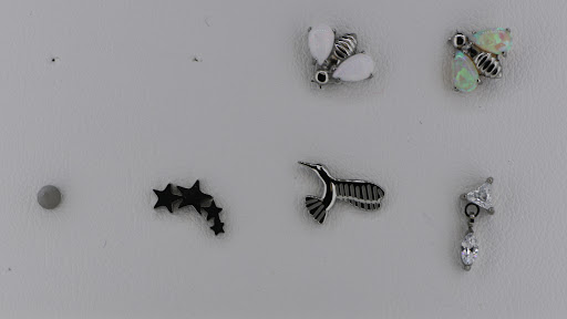 Explore haitian tattoo ideas, creative tattoo ideas in Des Moines, available at Axiom Body Piercing Studio