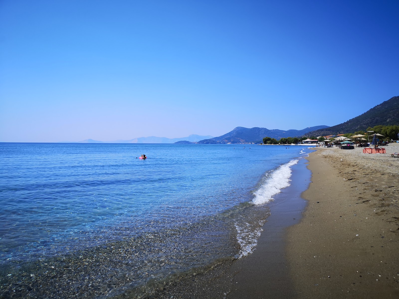 Foto van Ormos beach met lange baai
