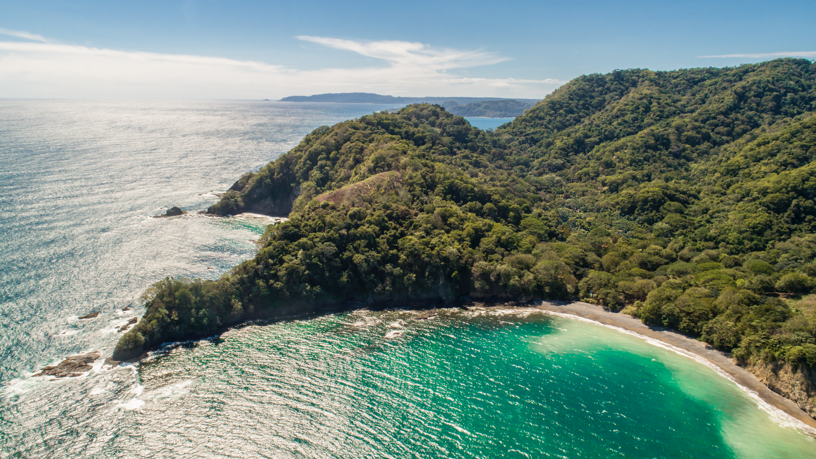 Playa Ventanas的照片 带有碧绿色纯水表面