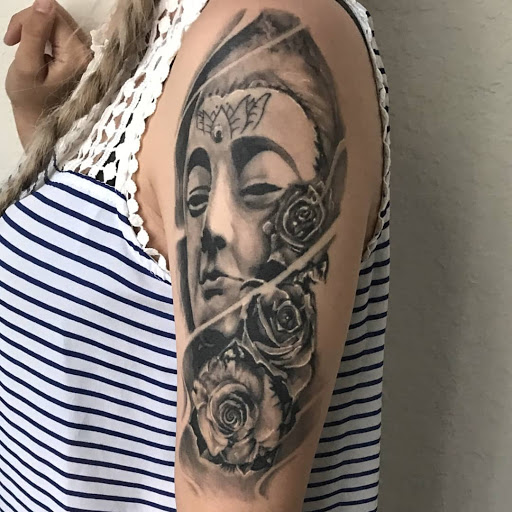 Explore chest plate tattoo ideas, creative tattoo ideas in Debary, available at Divine Line Tattoos