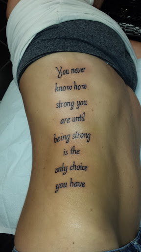 Explore religious elbow tattoo ideas, creative tattoo ideas in Gainesville, available at Bodytech Tattooing & Piercing