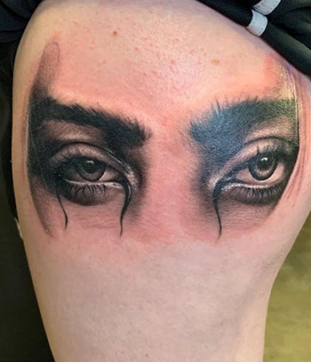 Explore unique knee tattoo ideas, creative tattoo ideas in Tulsa, available at Spaded and Jaded Tattoo