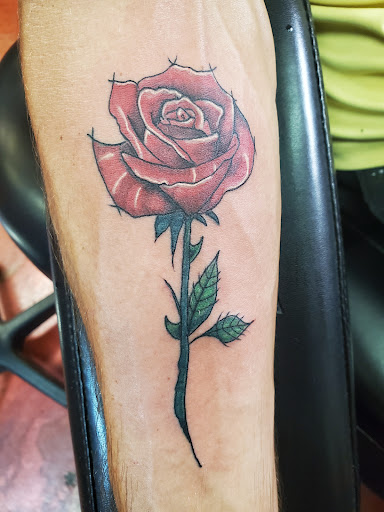 Explore black male tattoo ideas, creative tattoo ideas in Inverness, available at The Perfect Spot Tattoos