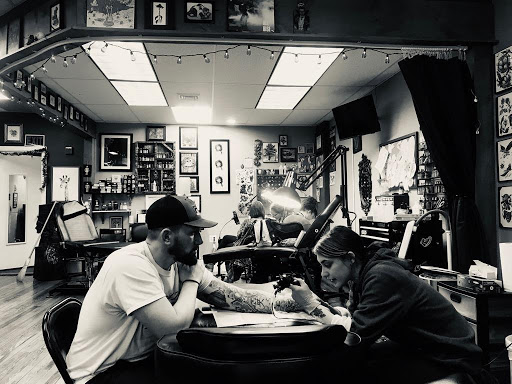 Find small palm tree tattoo ideas for your next unique tattoo in Royersford at Kingfisher Collective Tattooing & Piercing