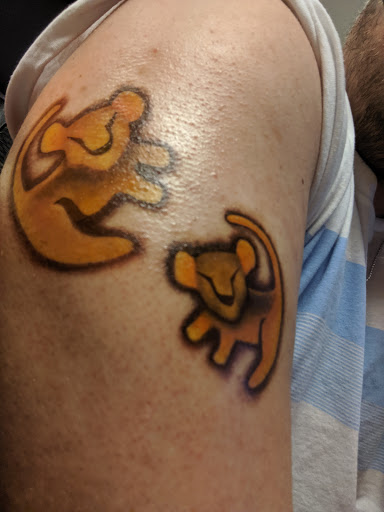 Explore family flower tattoo ideas, creative tattoo ideas in Buford, available at Wild Tribe Tattoos and Piercings