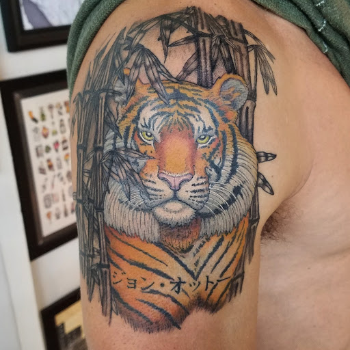 Explore upper back tattoo ideas male, creative tattoo ideas in Chicago, available at Royal Flesh Tattoo and Piercing