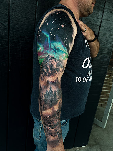 Explore highland cow tattoo ideas, creative tattoo ideas in Fairmont, available at Heretic Ink