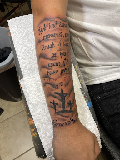 Explore afro tattoo ideas, creative tattoo ideas in Beaumont, available at Solid Black Ink Tattoo Parlor