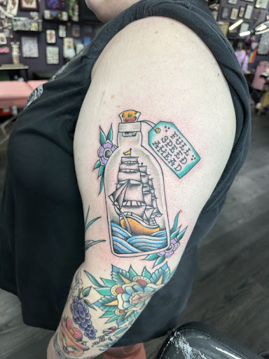 Explore calf tattoo ideas for men, creative tattoo ideas in Erie, available at Lake Effect Tattoo Parlour