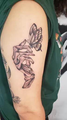 Explore small cover up tattoo ideas female, creative tattoo ideas in Decatur, available at Exclusive Ink Tattoos & Body Piercings 22nd & Wood