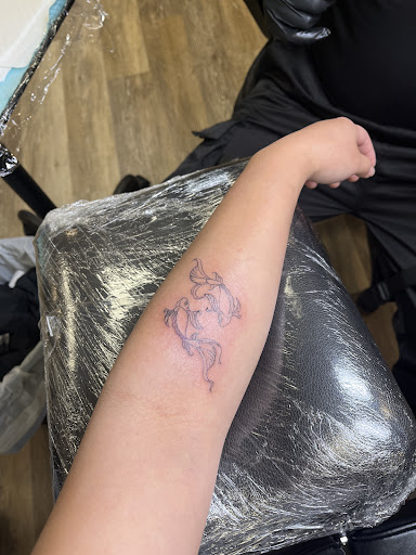 Explore tattoo ideas butterflies flowers, creative tattoo ideas in Ocoee, available at Fine Ink Studios Tattoos