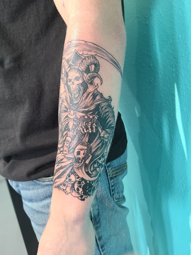 Explore female calf tattoo ideas, creative tattoo ideas in Buckeye, available at Irie Art in Ink
