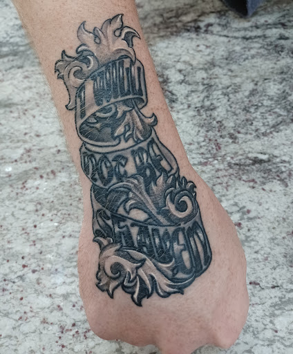 Explore dandelion tattoo ideas, creative tattoo ideas in Winston Salem, available at Deja Vu